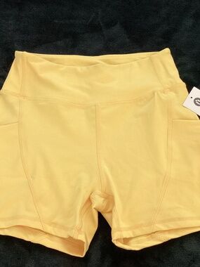 O to S, NEW WITH TAGS, size M, yellow bike shorts